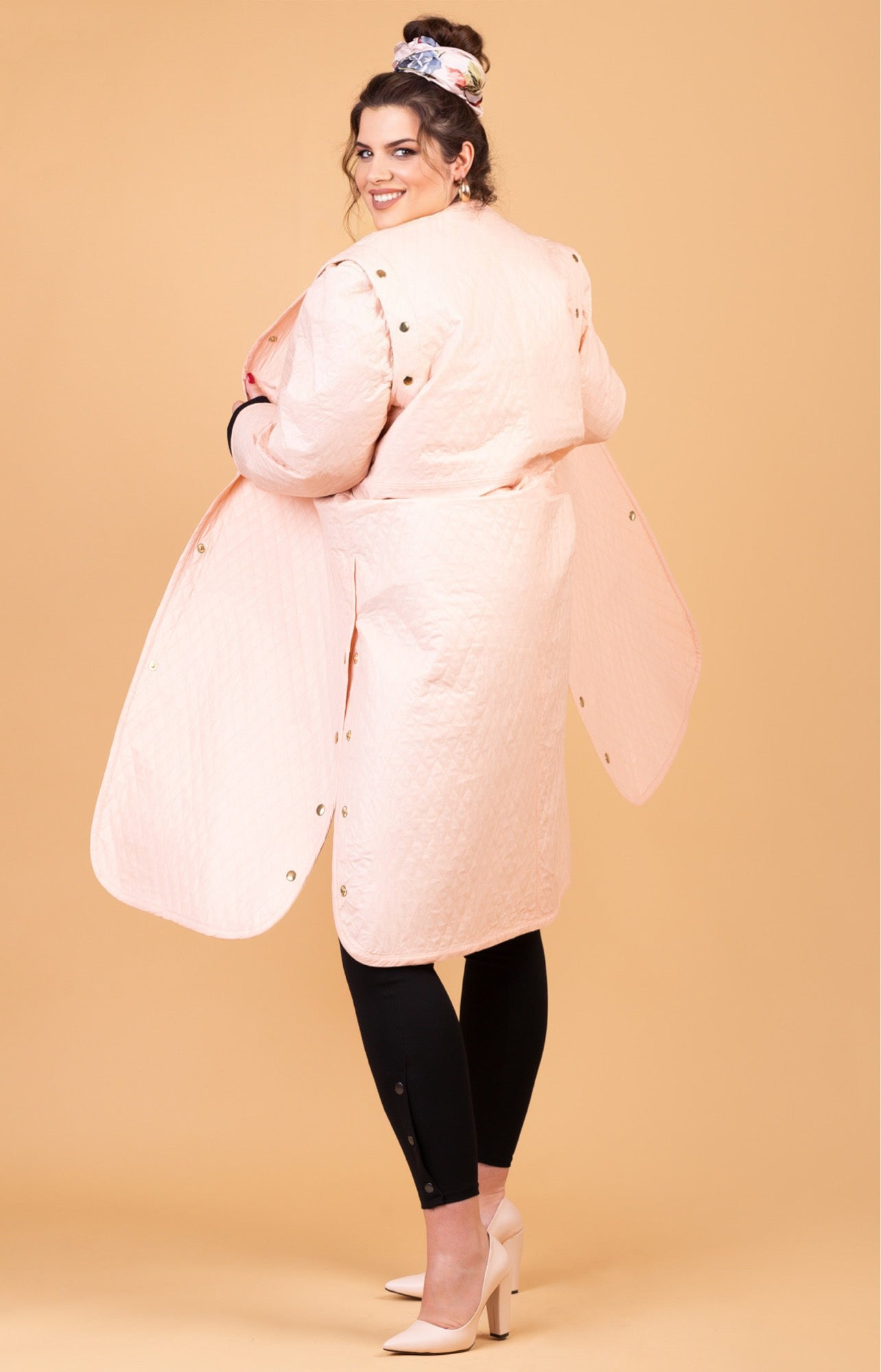 Coat-vest with golden rivets