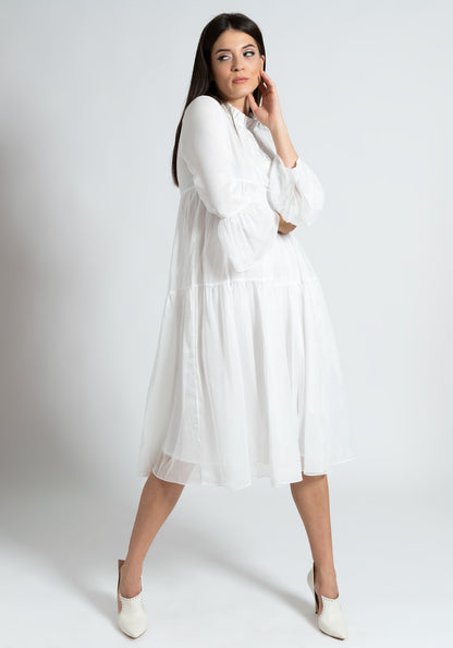 Извезен долг бел фустан