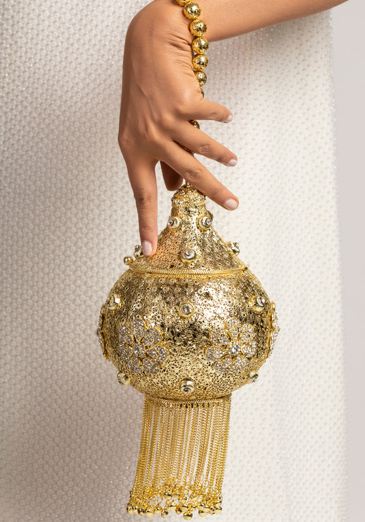 Golden round luxury handbag